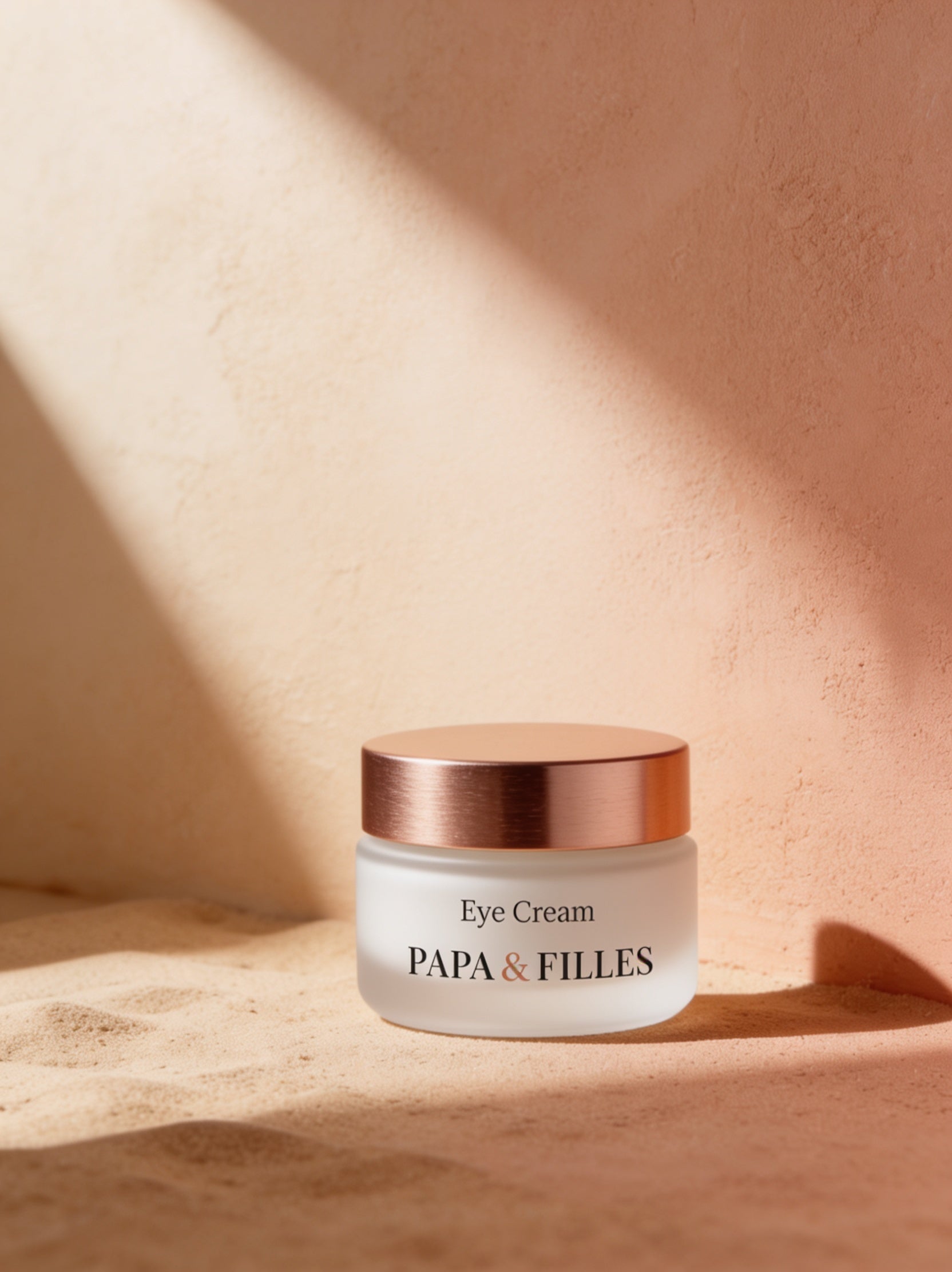 PAPA & Filles Eye Cream jar on a warm editorial beauty background